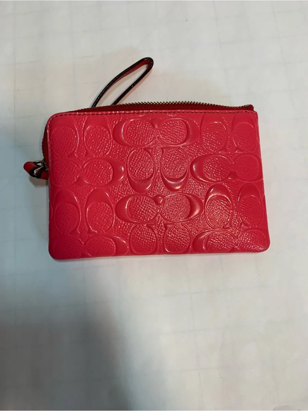 Coach PinkPatent Embossed Tablet Sleeve with Gold Logo